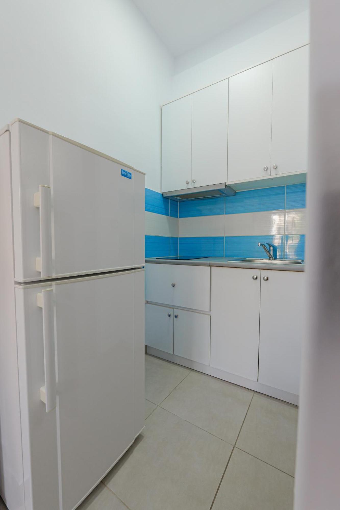 Guesthouse Moonlight Downtown Ксамил Экстерьер фото